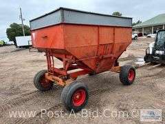 250 Bushel Gravity Box, With MN 10 Ton Running Gear.