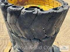 4 x Skid Steer Tires On 8 Bolt Rums, Owner Stated "12.0 U 16.5 De