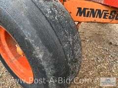 250 Bushel Gravity Box, With MN 10 Ton Running Gear.