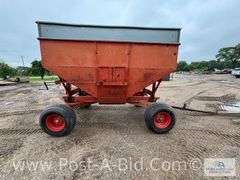 250 Bushel Gravity Box, With MN 10 Ton Running Gear.