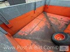 250 Bushel Gravity Box, With MN 10 Ton Running Gear.