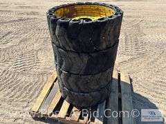 4 x Skid Steer Tires On 8 Bolt Rums, Owner Stated "12.0 U 16.5 De