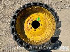 4 x Skid Steer Tires On 8 Bolt Rums, Owner Stated "12.0 U 16.5 De