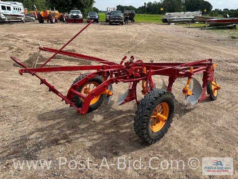 Restored 3 Bottom, Minneapolis Moline Slat Bottom Plow.