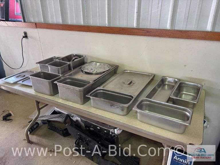 Approximately 22 Pieces Of Stainless Steel NIS Serving Ware.