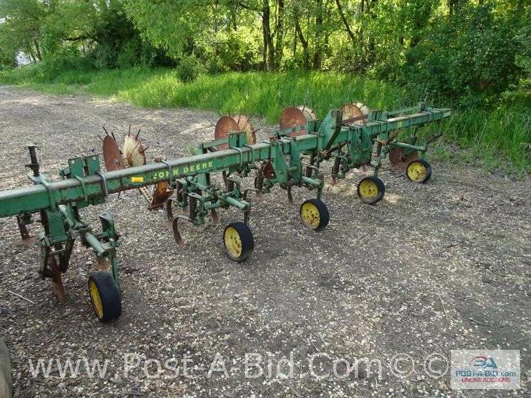 John Deere 4 Row R.M. Cultivator.