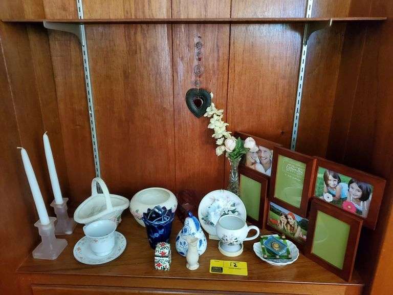 Lot of miscellaneous household décor, including candle stands, vases, picture frames, and more