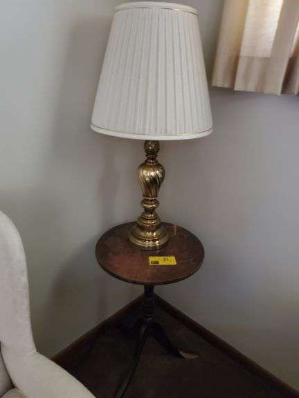 Small stand table with brass lamp