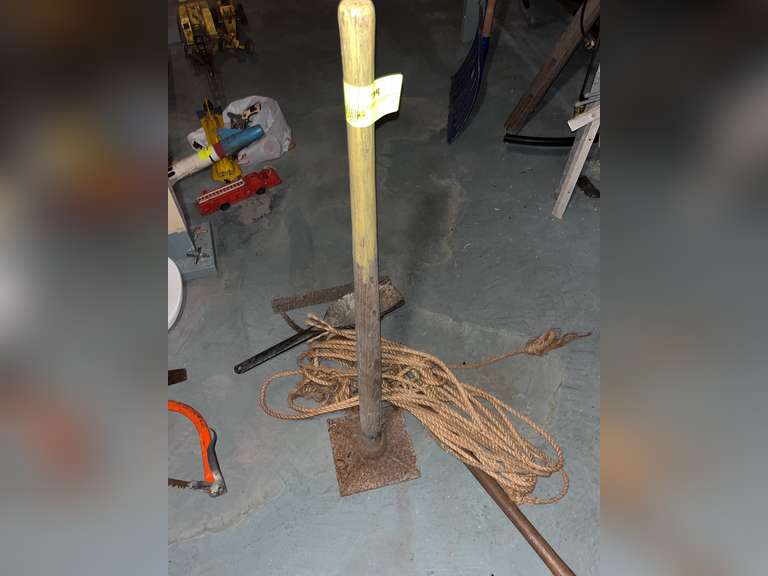 tamper, weed wacker and rope