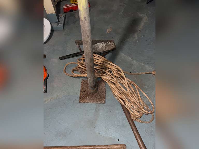 tamper, weed wacker and rope