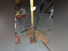 tamper, weed wacker and rope