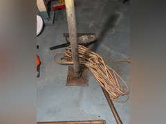 tamper, weed wacker and rope