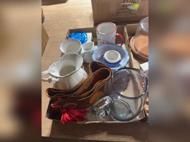 Various dishes, child's plate, cheese cutter, and cutting board etc.