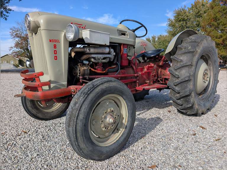 Ford 800 Tractor, 4 Cylinder, Gasoline, good metal, partially restored / home restoration, excellent Parade condition, excellent running order, fresh tune up, New Battery, 12V conversion, good rear tires, all holding air, S#EAF6015J