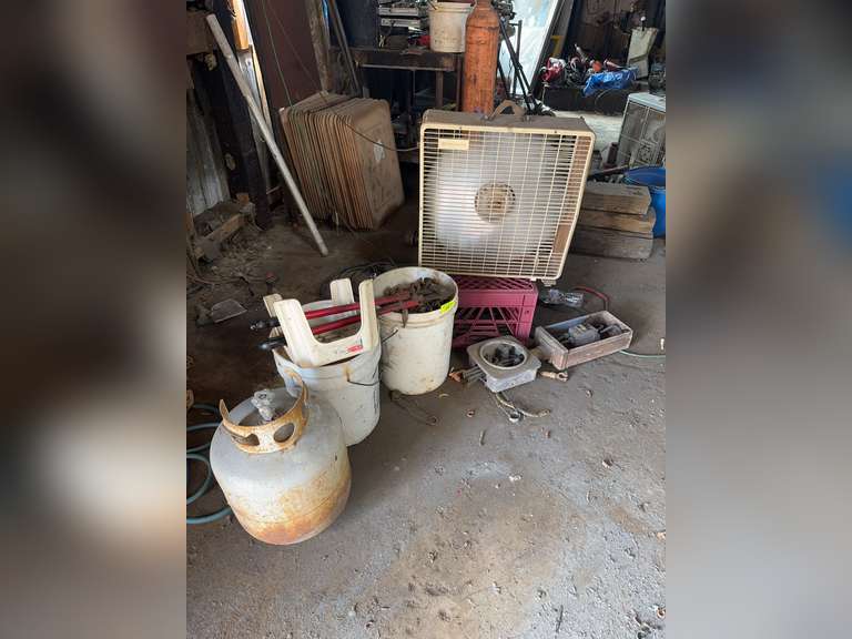 Box fan, bucket of chains, bolt cutters, and more