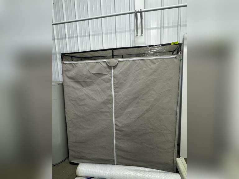 Enclosed Clothes rack - Parrott Marketing Group, LLC