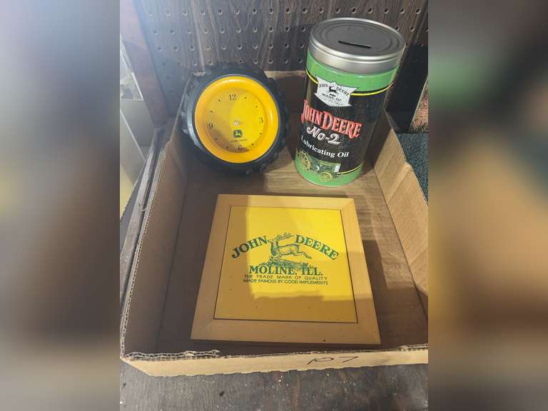John Deere hot plate, clock with no hands, bank, picture, and rug