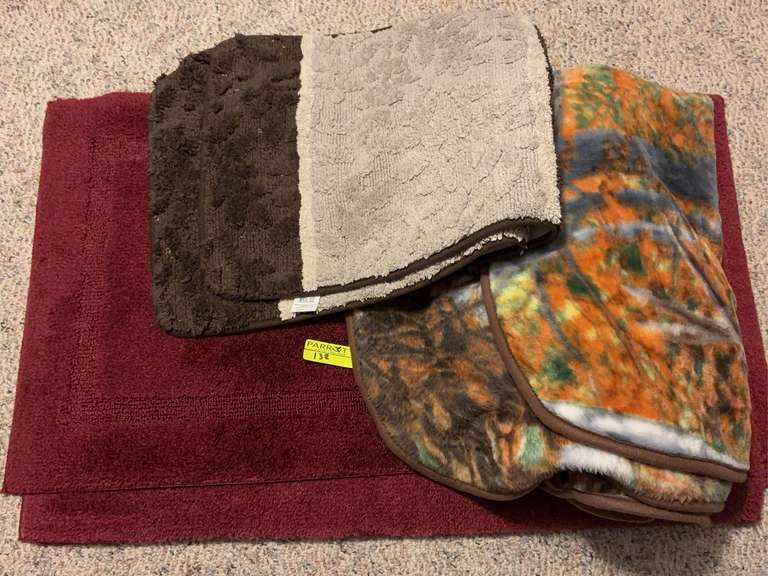 Various indoor rugs and blanket