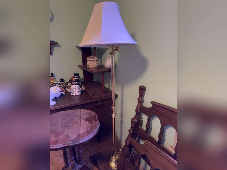 Gold colored floor lamp