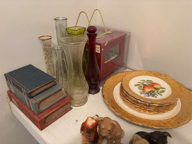 Contents of shelf in right side of closet