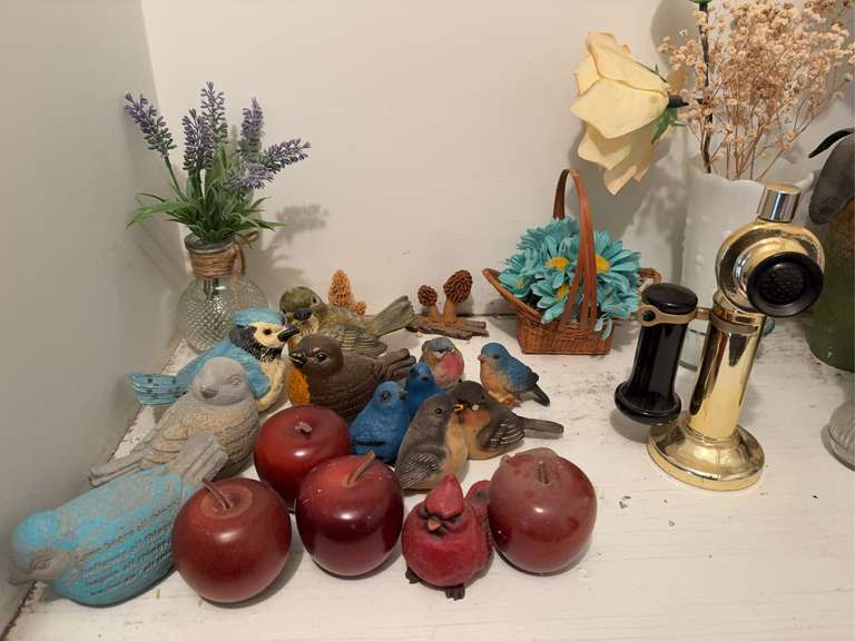 Contents of shelf in left side of closet