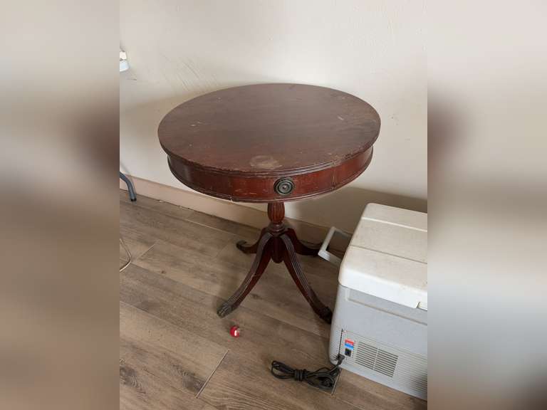 Drum table with brass paw feet and a single drawer (top is loose)