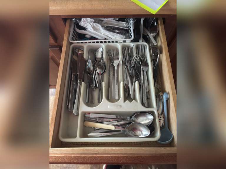 Drawer of stainless steel utensils