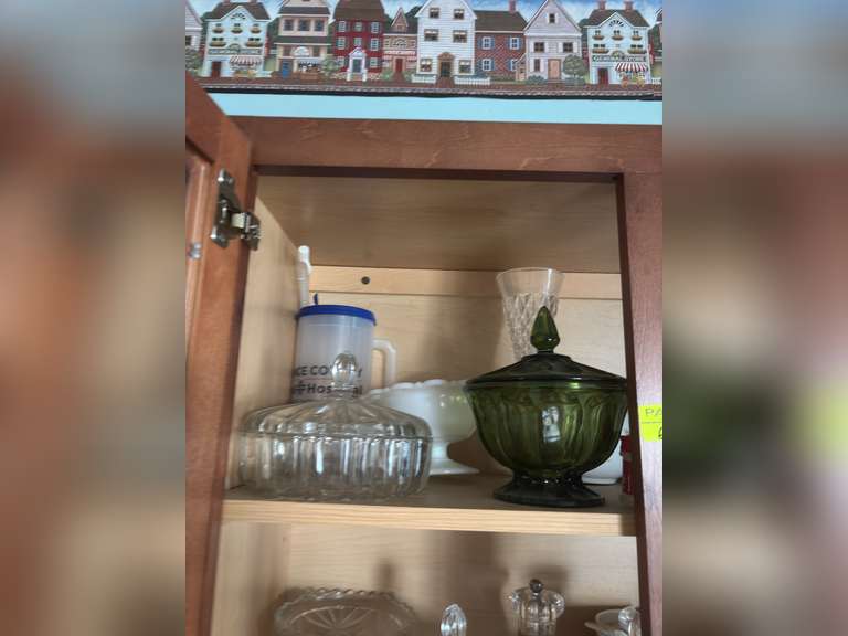 Shelf of Glassware (covered candies and other glass dishware)