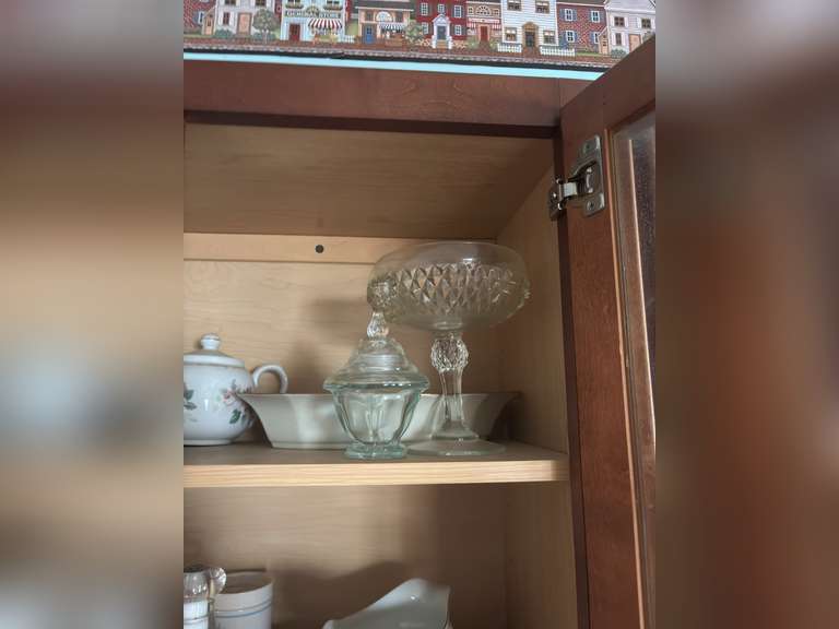 Shelf of Glassware (covered candies and other glass dishware)