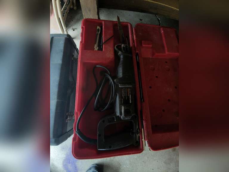 Tool box of sockets, Craftsman Reciprocating Saw, and Toolbox of Misc.