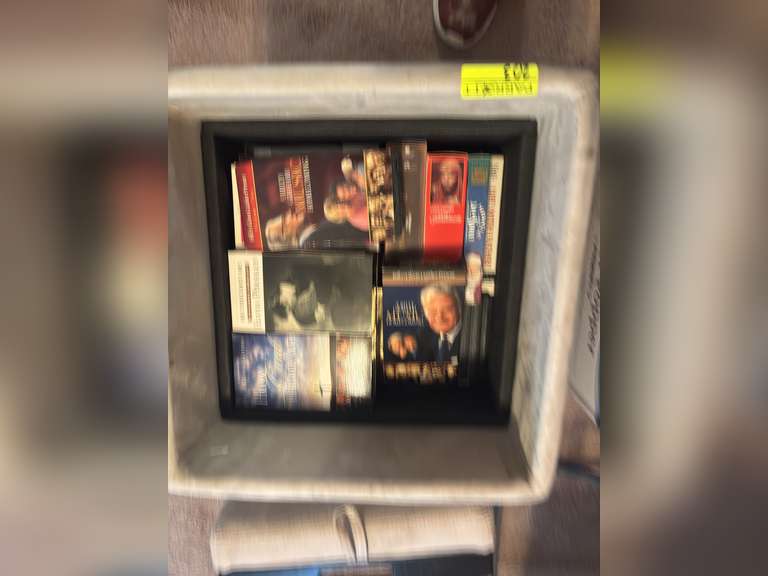 Ottoman with misc. vhs inside