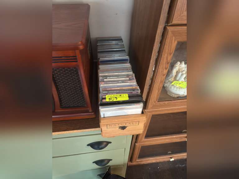 Cd holder with a variety of cds (country,Christian, and more