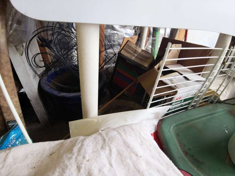Content on floor/various gardening supplies