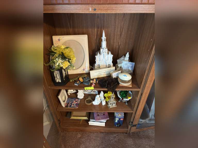 Contents of Glass door cabinet (church decorations, Redd Skelton coasters, Religious books,etc.)