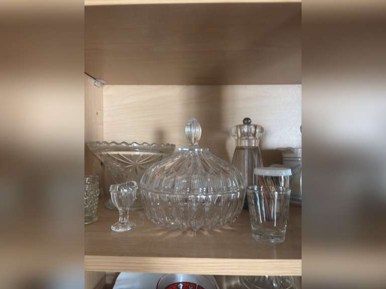 Shelf of glassware ( eye washer, covered candy, toothpick holder, and other glassware