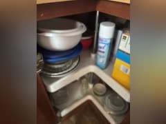 Lazy Susan with bowls, plates, and plastic ware and more