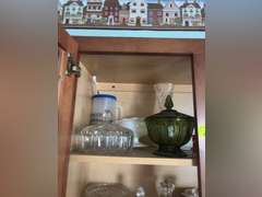 Shelf of Glassware (covered candies and other glass dishware)