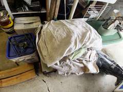Content on floor/various gardening supplies