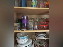 Middle shelf of cabinet-4 Covered containers, cups, and bowls