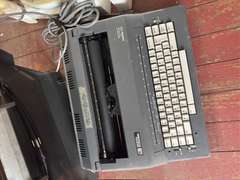 Smith Corona Electric Typewriter and Bissell spotlifter