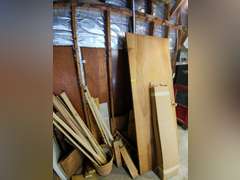 Back wall of wood misc, door, and etc.