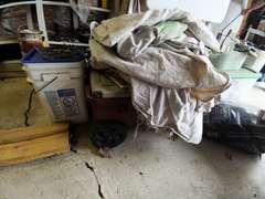 Content on floor/various gardening supplies