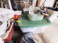 Content on floor/various gardening supplies