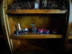4 shelves of Americana, Ozark pillows, candle holders etc