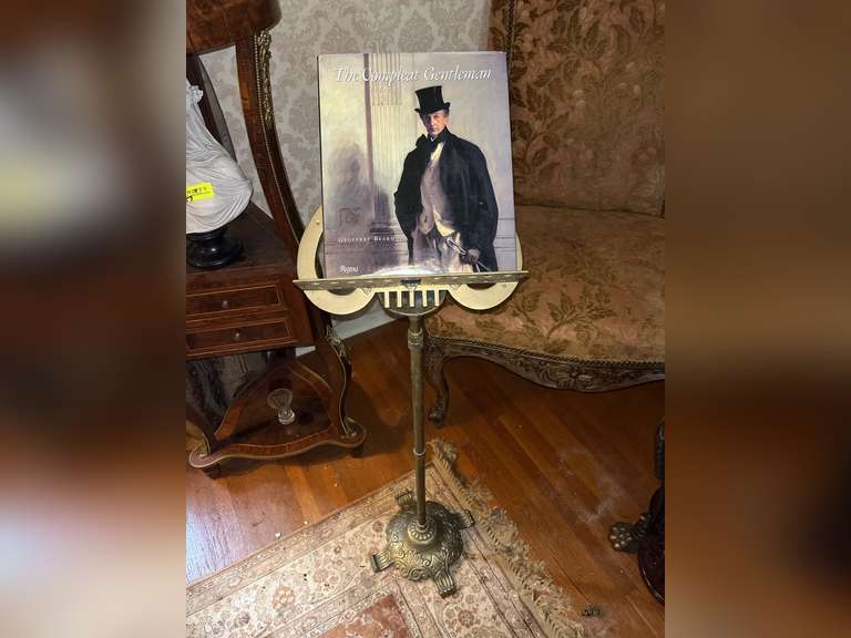 Brass music stand with complete gentlemen book