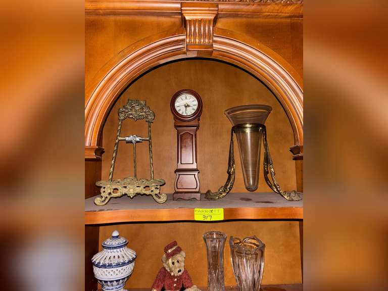 Brass easel, suspended vase, and Chinese clock