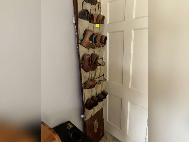 Shoe rack with various shoes (Stacy Adams)