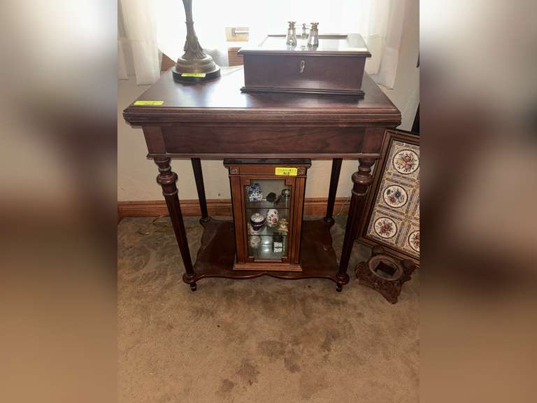 Occasional burled looking table with bottomless shelf