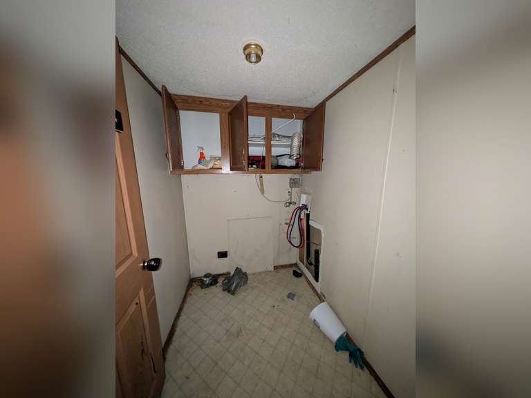 Home with Walk-Out Basement & Outbuildings on 5+/- Acres