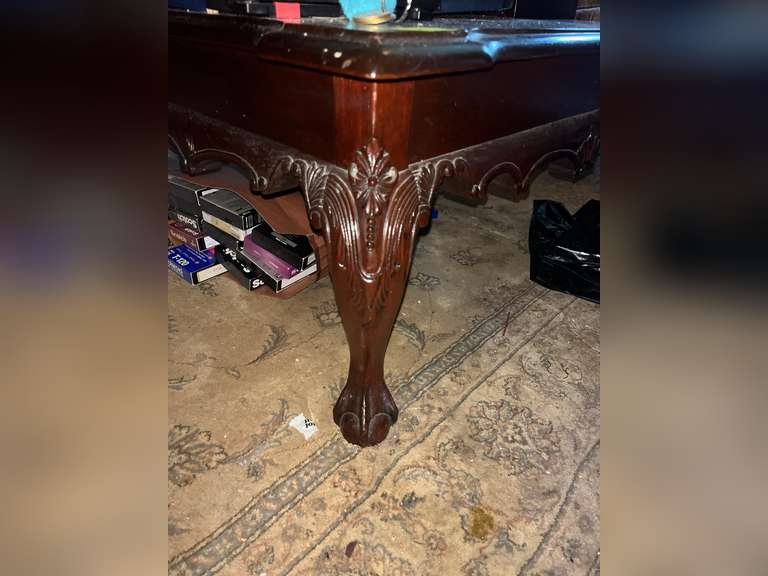 Large coffee table with carved legs